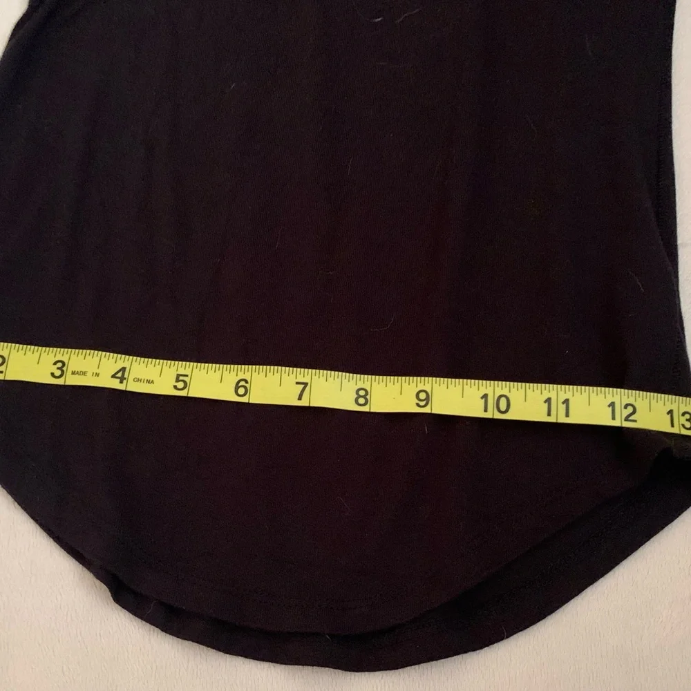 FREE PEOPLE ladies 95% rayon black “To the Tropics” size medium, long sleeve top